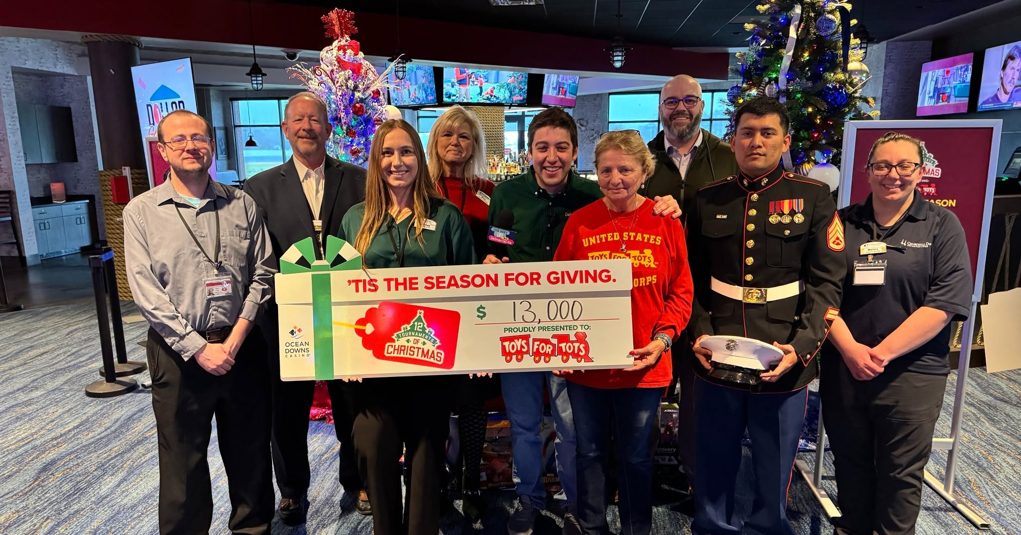 Check presentation to Toys for Tots for $13,000