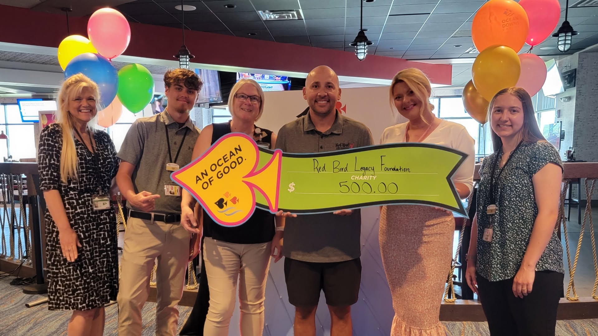 Check presentation to the Red Bird Legacy Foundation for $500